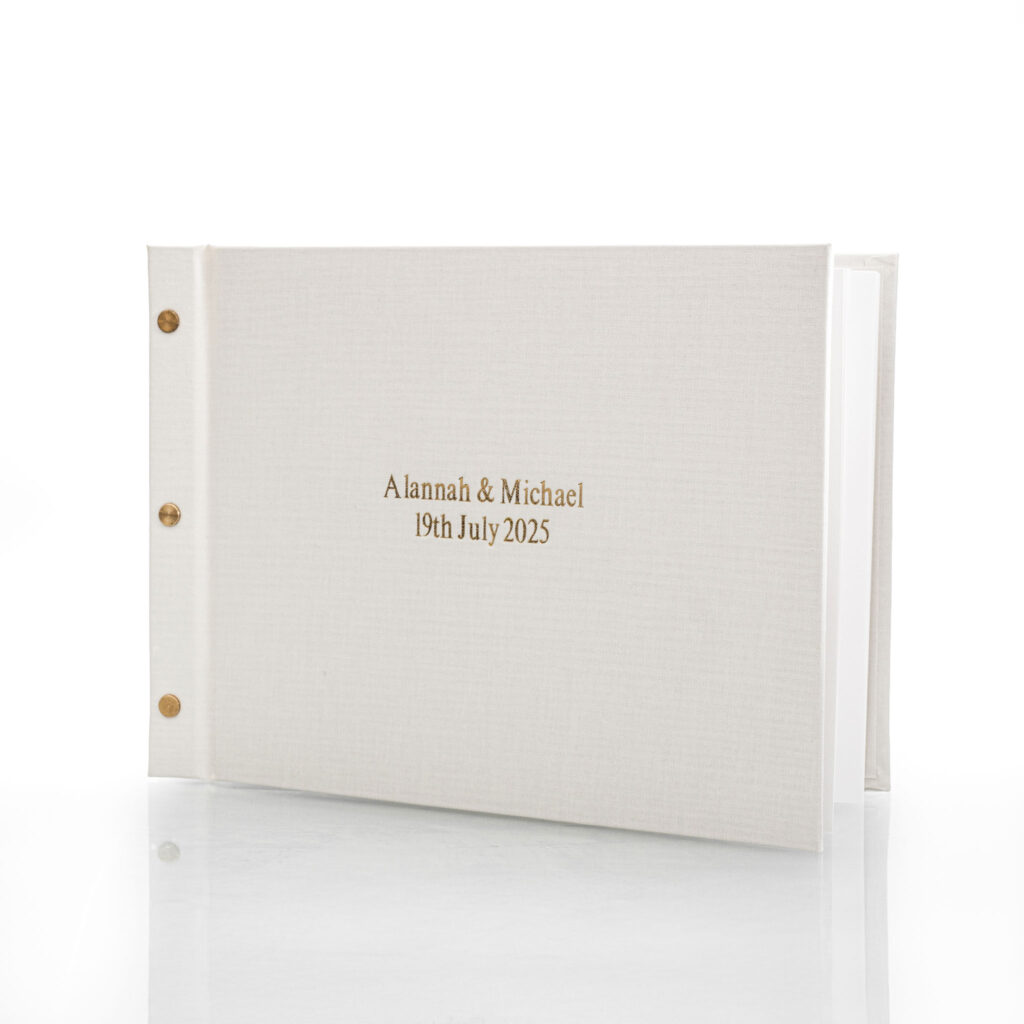 standard-deboss-gold-foil-white-guestbook-uprightjpg.jpg