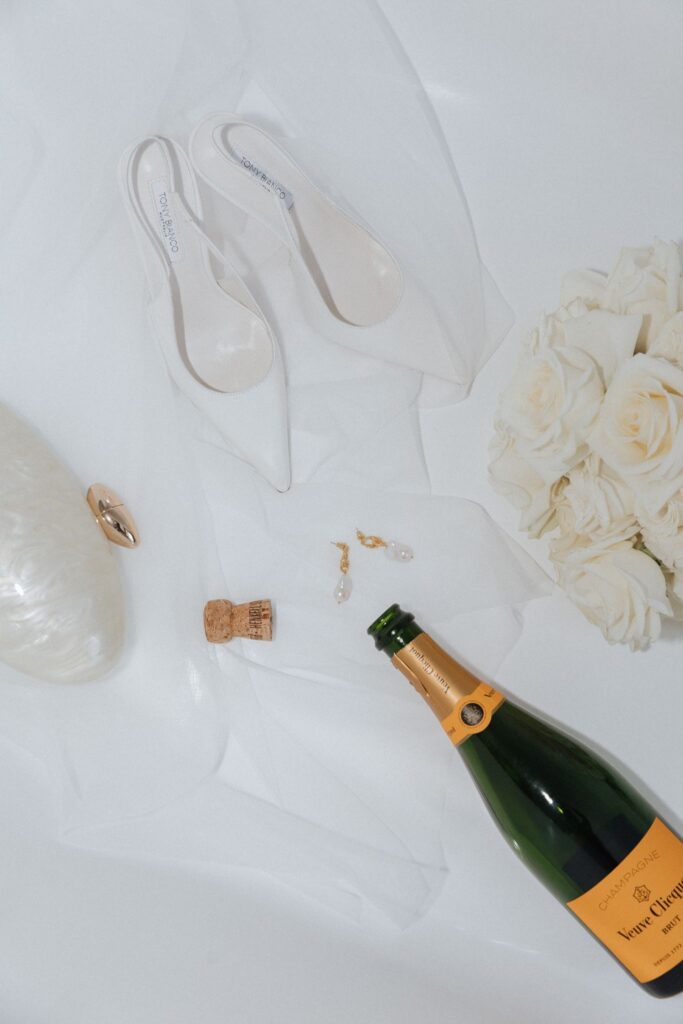 luxury-wedding-details-flat-lay-shoes-champagne-new-zealand.jpg